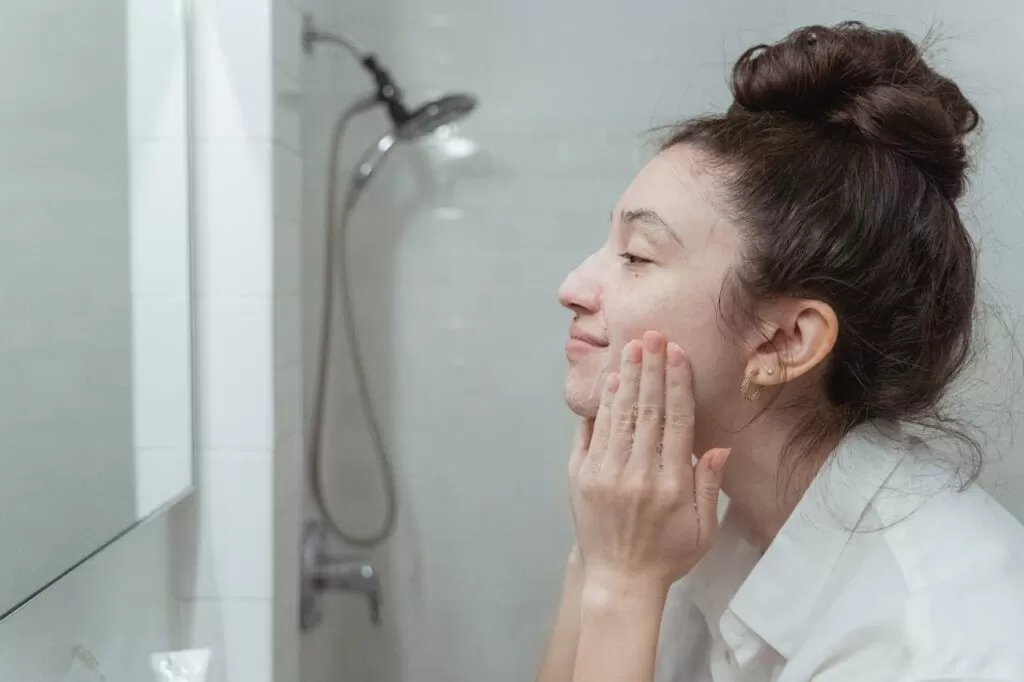 a woman doing her night beauty routine