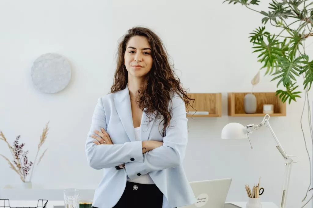 a woman wearing a blazer 